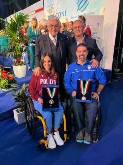 Il Presidente Scarzella, il DT Willy Fuchsova con gli azzurri Petrilli e Travisani
